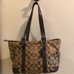 Signature Brown Coach purse with leather straps